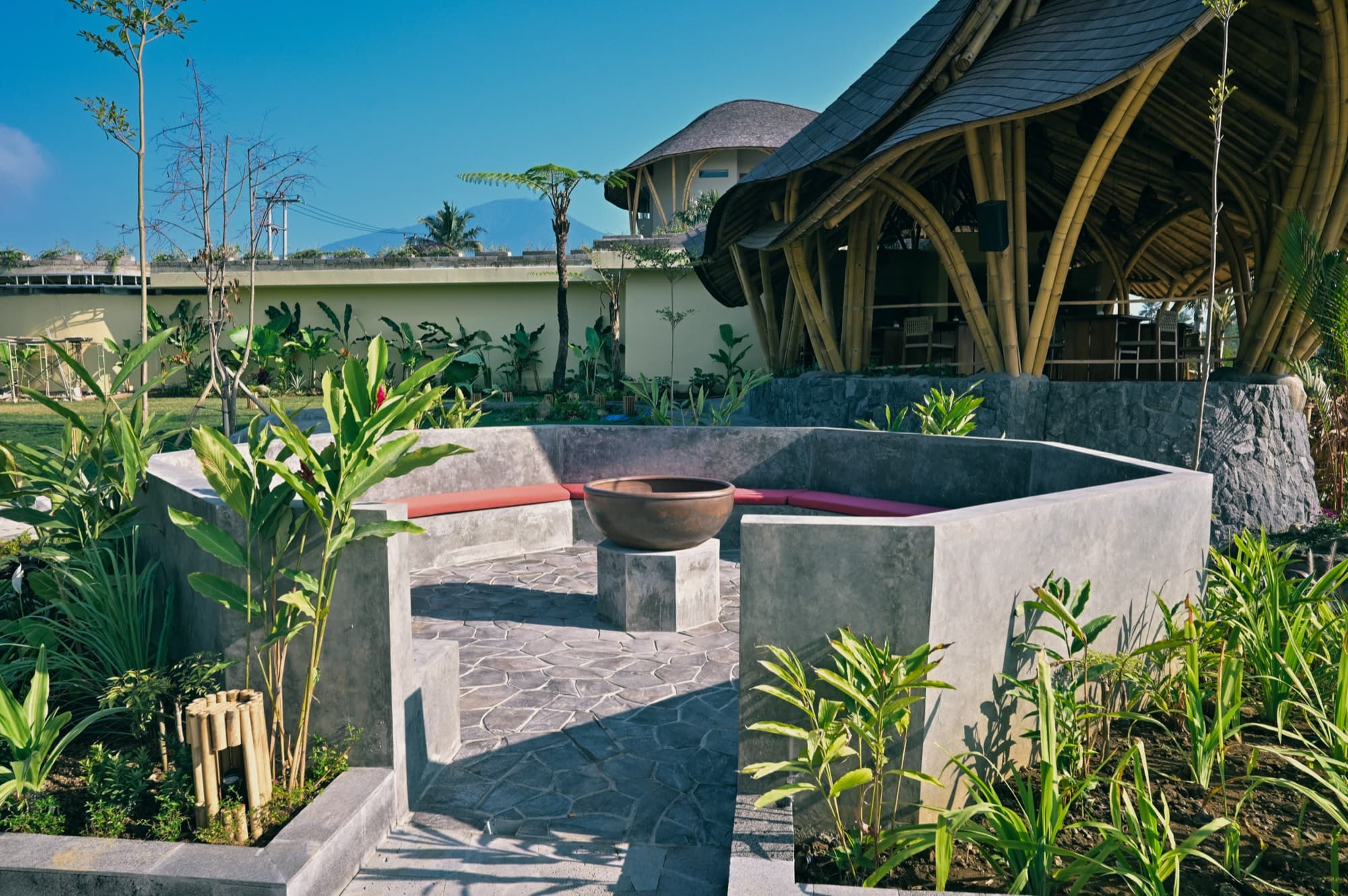 Sunken fire pit lounge in the gardens beside the bamboo pavilion at Spirit Hills